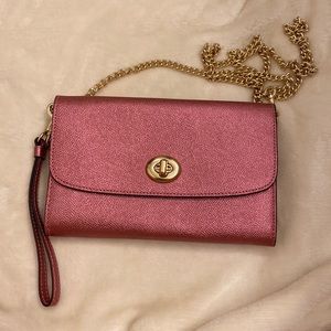 Metallic pink Coach crossbody purse